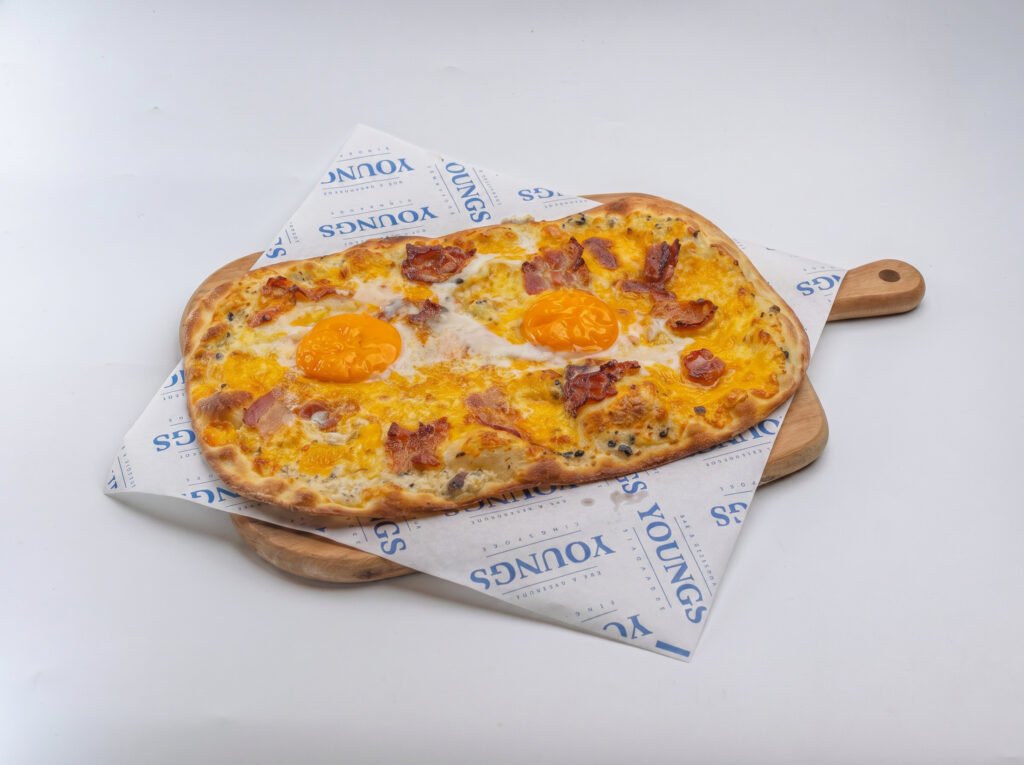 YOUNGS Cosford Container Park bacon & egg Pizza
